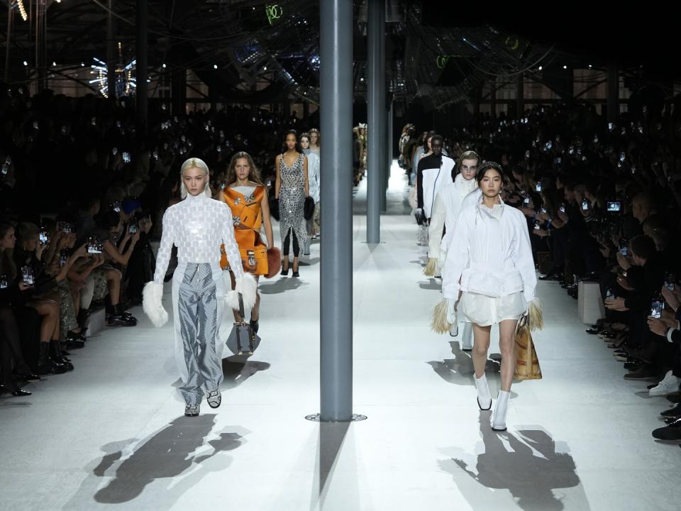 Felix and Jung Ho-yeon walk the runway during the Louis Vuitton’s fall 2024 show.