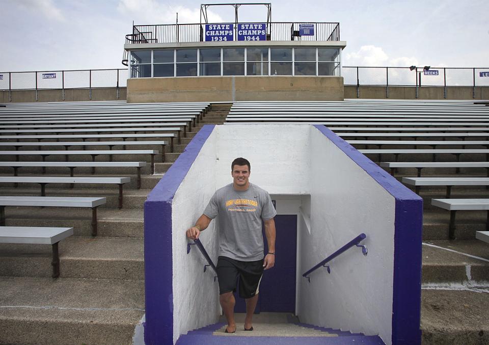 FILE -- Washington Redskins player and Muncie native Ryan Kerrigan poses for a photo in the bleachers at Muncie Central's football field Wednesday.