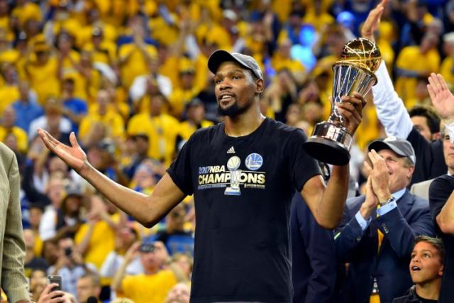 Kevin Durant, holding Finals MVP trophy, exits car leaving arena to  celebrate with Warriors fans (video) - NBC Sports