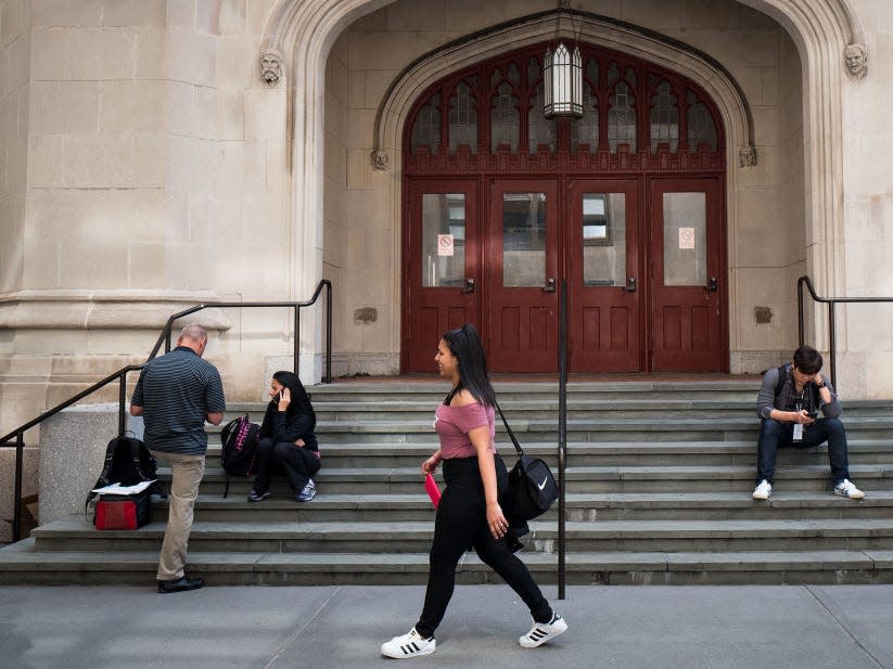 college campus students walk