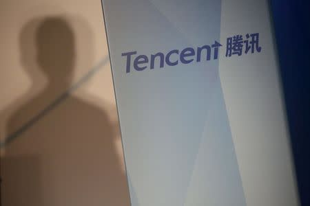 Tencent comany name is displayed at a news conference in Hong Kong, China March 17, 2016. REUTERS/Bobby Yip/File Photo