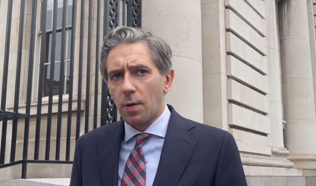 Simon Harris speaking to the media outside Government Buildings in Dublin