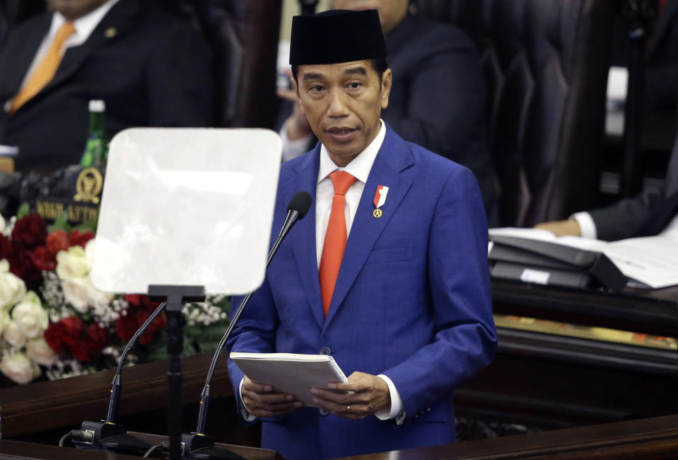 Indonesia's President Joko Widodo delivers his state of the nation address ahead of the country's Independence Day at the parliament building in Jakarta, Indonesia, Friday, Aug. 16, 2019. Indonesia celebrates the 74th anniversary of its independence from the Netherlands on Saturday, Aug. 17. (AP Photo/Achmad Ibrahim)