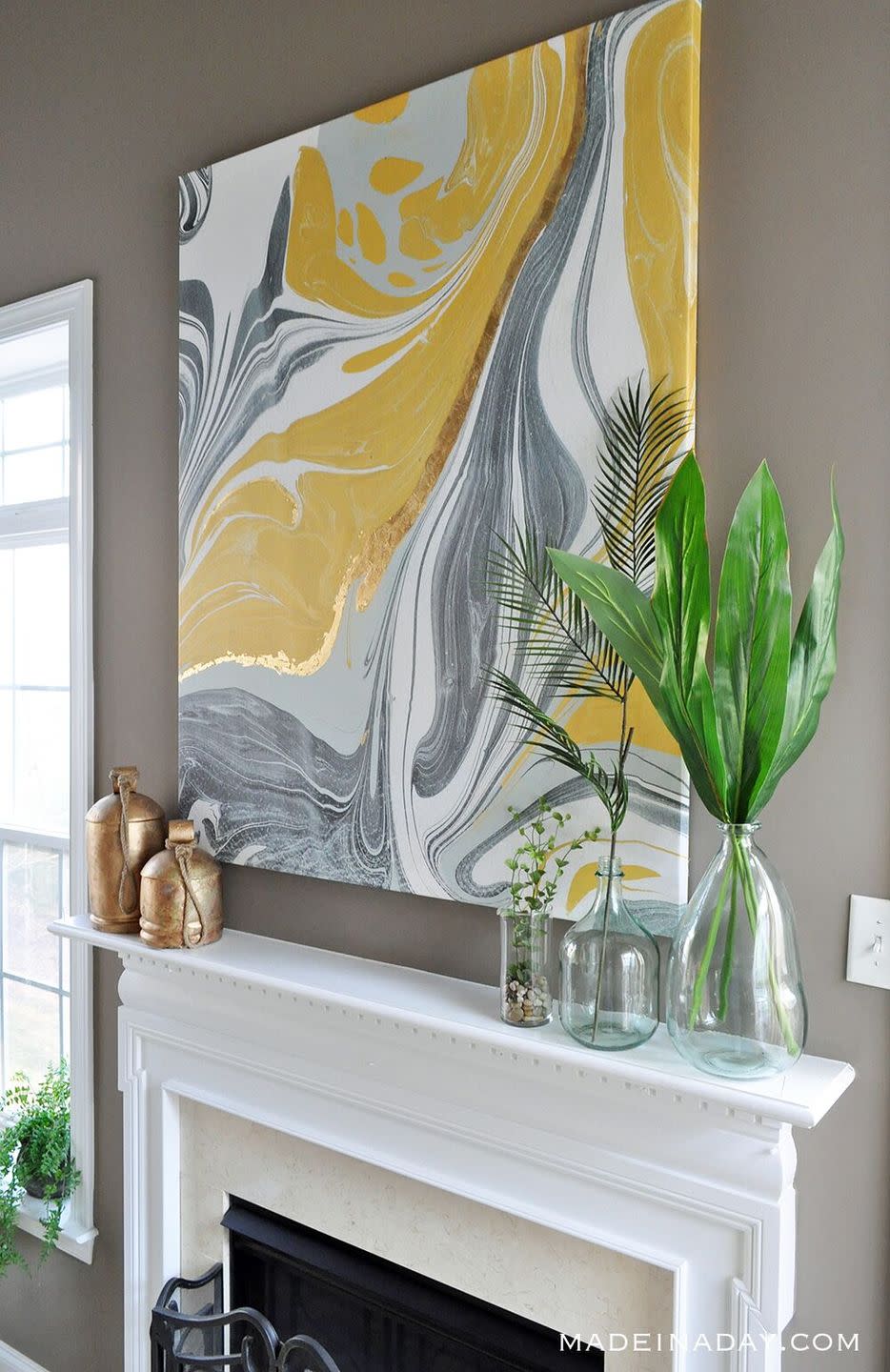 <p>Marbled-anything can be hypnotic, from countertops to cake to those pages inside antique books, but a marbled piece of wall art? Sign us up, especially when it showcases touches of gold.</p><p><strong>Get the tutorial at <a href="https://madeinaday.com/gold-gilded-marble-canvas-glam-wall-art/" rel="nofollow noopener" target="_blank" data-ylk="slk:Made in a Day;elm:context_link;itc:0;sec:content-canvas" class="link ">Made in a Day</a>.</strong></p><p><a class="link " href="https://www.amazon.com/Mod-Podge-1470-Acrylic-Sealer/dp/B003VYD9DM/?tag=syn-yahoo-20&ascsubtag=%5Bartid%7C10050.g.31153820%5Bsrc%7Cyahoo-us" rel="nofollow noopener" target="_blank" data-ylk="slk:SHOP CLEAR ACRYLIC SEALERS;elm:context_link;itc:0;sec:content-canvas">SHOP CLEAR ACRYLIC SEALERS</a></p>