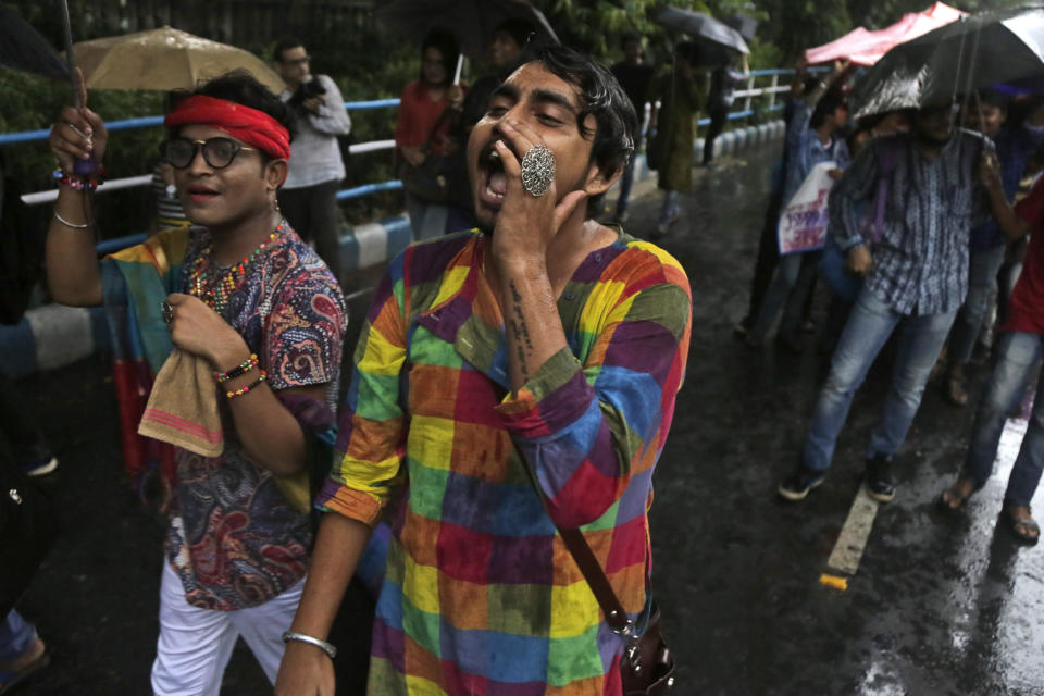 Gay rights activists walk in a rally to commemorate the twentieth anniversary of the first pride parade in the country, in Kolkata, India, Saturday, June 29, 2019. (AP Photo/Bikas Das)