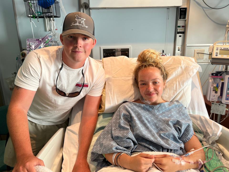 Rhett Willingham, left, a 2017 Satellite High graduate, and his sister Addison Bethea, 17, right, pose for a photo a day after she was attacked by a shark off the coast of Keaton Beach in Taylor County.