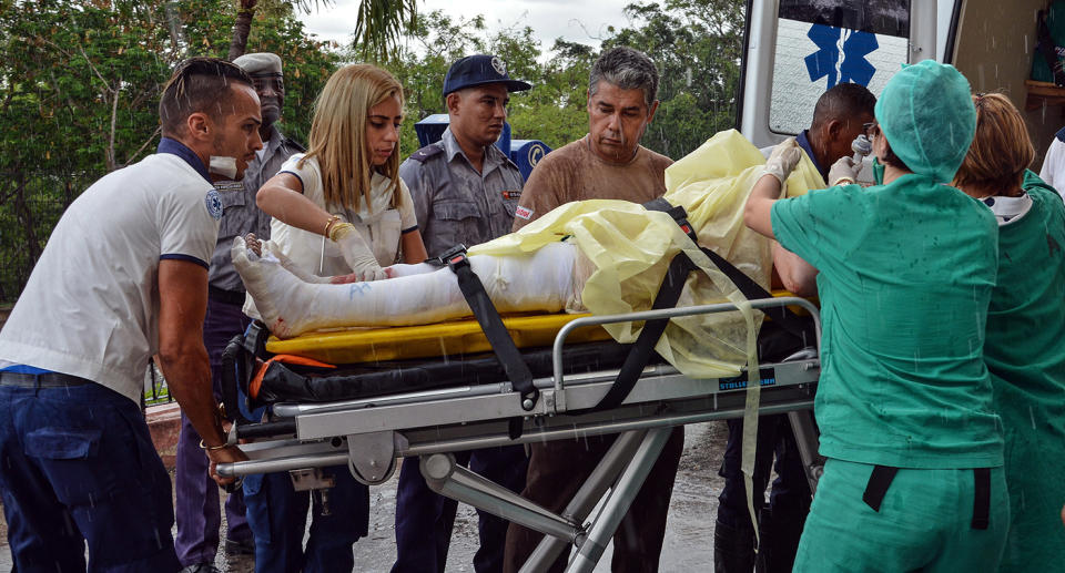 A survivor is transferred to the Calixto Garcia Hospital. Source: Getty