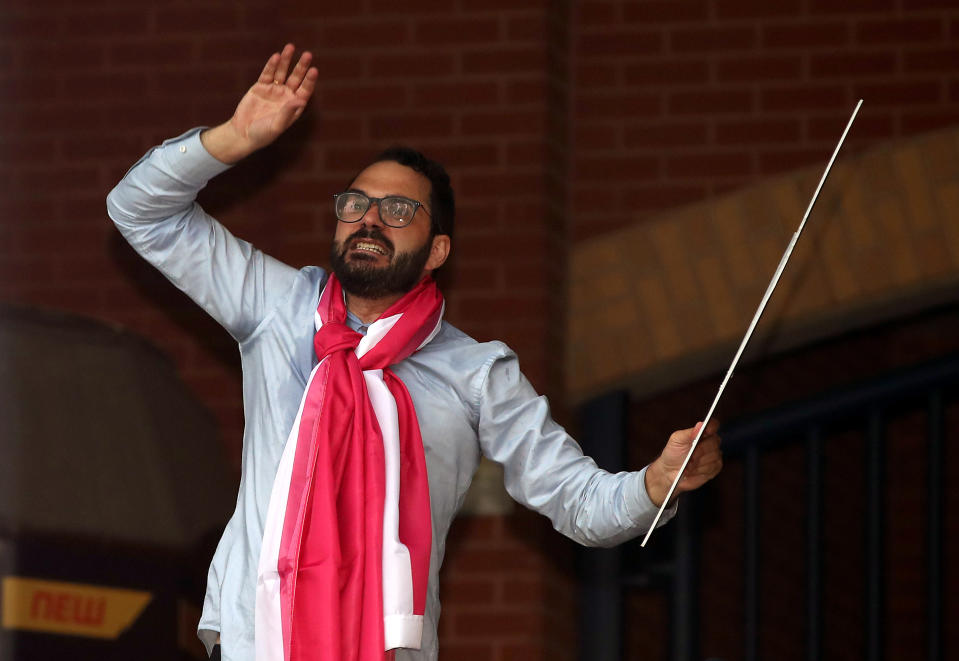 Leeds United Director of Football Victor Orta celebrates with fans outside Elland Road after Huddersfield Town beat West Bromwich Albion to seal their promotion to the Premier League.