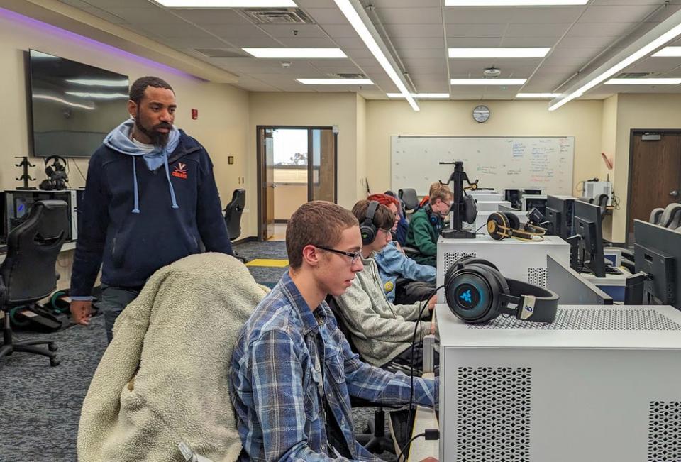 Aberdeen Central esports coach Andre Cobbs looks on as Ethan Goetz practices in the school's esports area. The state’s best esports teams will converge at South Dakota State University on Friday and Saturday, March 22-23, 2024 for the first high school state tournament.