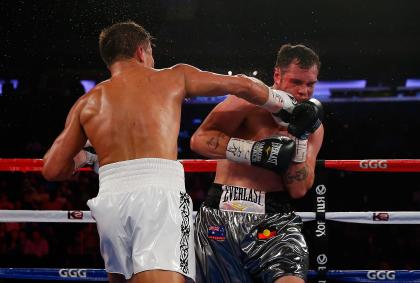 NEW YORK, NY - JULY 26: Gennady Golovkin lands the knockout punch on Daniel Geale. (Photo by Mike Stobe/Getty Images)