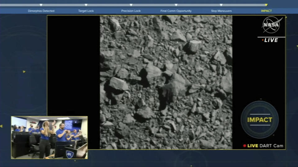 In this image made from a NASA livestream, the Double Asteroid Redirection Test spacecraft crashes into an asteroid on Monday, Sept. 26, 2022. (ASI/NASA via AP)