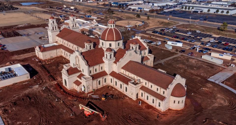 Crews continue work Monday, Dec. 5, 2022, on the Blessed Stanley Rother Shrine in Oklahoma City.