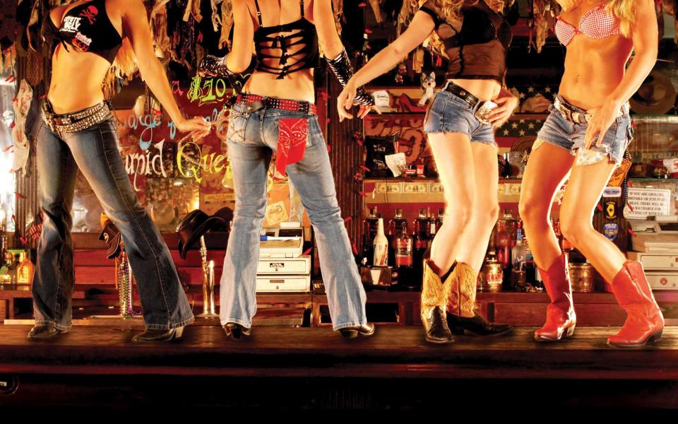 <p><strong>Real name: </strong><a rel="nofollow noopener" href="http://www.coyoteuglysaloon.com/newyork/" target="_blank" data-ylk="slk:Coyote Ugly;elm:context_link;itc:0;sec:content-canvas" class="link ">Coyote Ugly</a></p> <p>Live out your <em>Coyote Ugly</em> fantasies (well, at least the part where you make it as a songwriter), at this New York City bar. Made famous by Piper Perabo and John Goodman in the movie of the same name, the dive gives off a similar vibe that’s seen on screen (think cheap drinks, women’s bras hanging from the ceiling, and bar-top dancers). Movie trivia: while the film gets its name (and exterior shots) from the East Village location, the interior was allegedly modeled after a Meatpacking watering hole called Hogs & Heifers (may it rest in peace). </p>