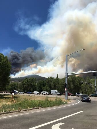 Fire is seen in Basalt, Colorado, U.S., July 4, 2018 in this picture obtained from social media. Picture taken July 4, 2018. NICK BLASTOS/via REUTERS