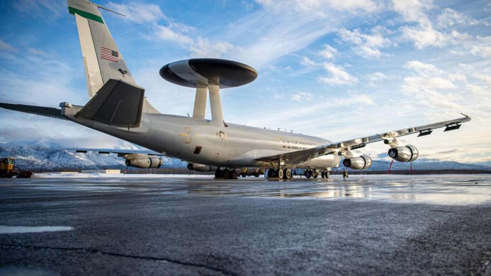 An E-3 Sentry airborne early warning and control system aircraft prepares to participate in Operation Noble Defender at Joint Base Elmendorf-Richardson, Alaska, Jan. 26, 2023. The Air Force proposed retiring two more AWACS as part of its fiscal 2024 budget, as it prepares to bring on a fleet of Boeing E-7A aircraft to replace them. (Tech. Sgt. Curt Beach/Air Force)