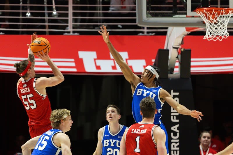 Utah guard Gabe Madsen shoots during game against BYU at the Huntsman Center in Salt Lake City on Saturday, Dec. 9, 2023.