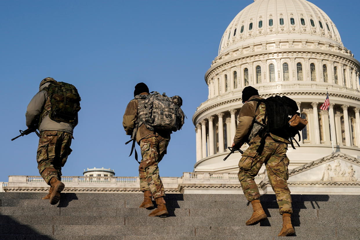 Members of the National Guard patrol at the U.S. Capitol after police warned that a militia group might try to attack the U.S. Capitol in Washington, U.S., March 4, 2021.      REUTERS/Joshua Roberts     TPX IMAGES OF THE DAY