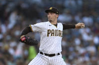 San Diego Padres starting pitcher Blake Snell works against the Philadelphia Phillies during the second inning of a baseball game Saturday, June 25, 2022, in San Diego. (AP Photo/Derrick Tuskan)