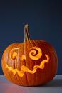 <p>Here's the foolproof way to carve out ghoulish features: Tape transfer paper to a pumpkin, draw on your design, remove the paper, and follow the outline with your carving tools. Sounds easy enough, right?</p>