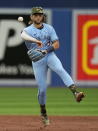 Toronto Blue Jays shortstop Bo Bichette throws out Cincinnati Reds' Tyler Stephenson during second-inning baseball game action in Toronto, Sunday, May 22, 2022. (Frank Gunn/The Canadian Press via AP)