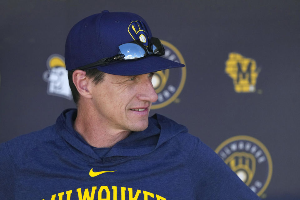 Milwaukee Brewers manager Craig Counsell pauses in the dugout prior to a spring training baseball game against the San Diego Padres Thursday, March 23, 2023, in Phoenix. (AP Photo/Ross D. Franklin)