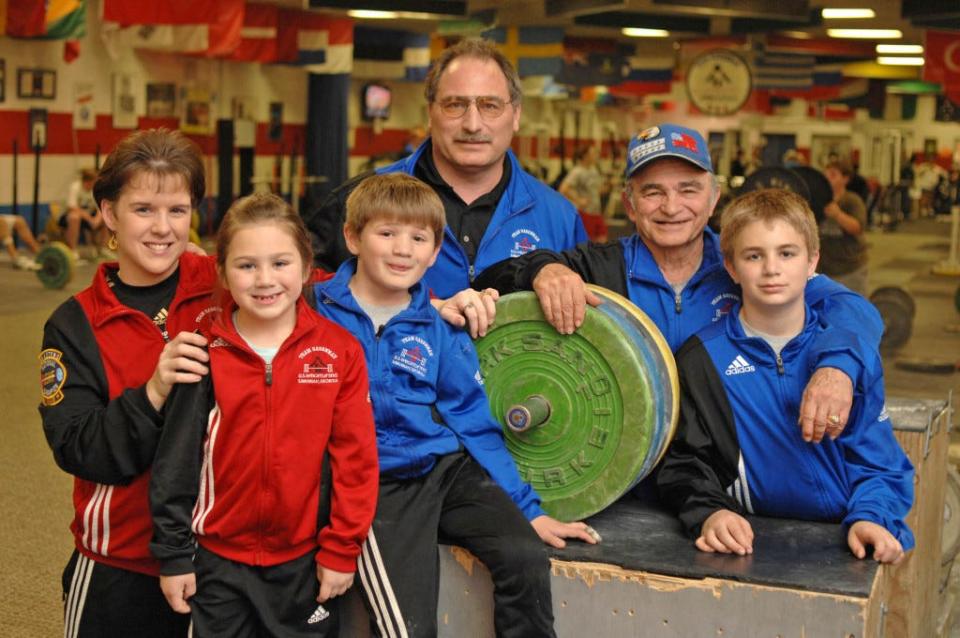 The Cohen family in 2009 from left: Sheryl, Carolyn, 6, Will, 9, Michael, Howard 76, and Michael Howard, 11, at the Anderson Cohen Weightlifting Center. (John Carrington/Savannah Morning News)