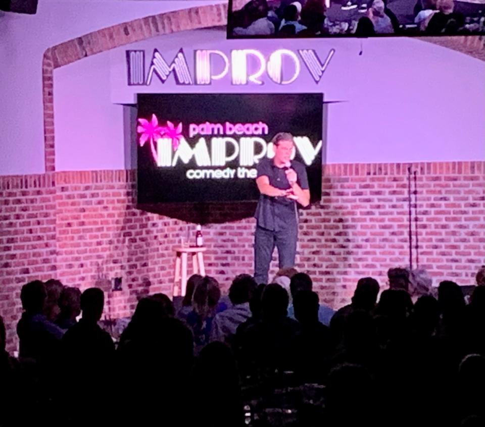 A comedian performs at The Palm Beach Improv on Wednesday, May 17, 2023.