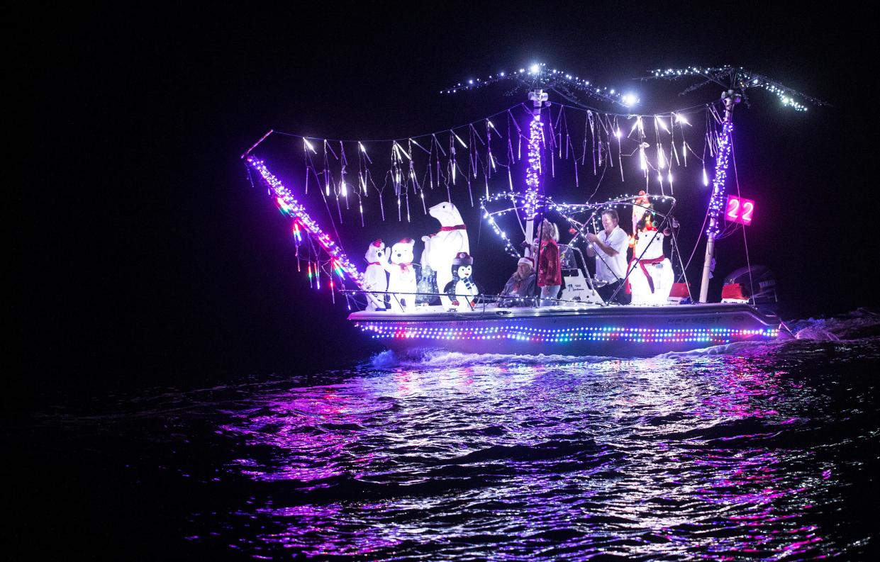Boats participate in the Fort Myers Beach parade on Saturday, Dec. 4, 2021. 