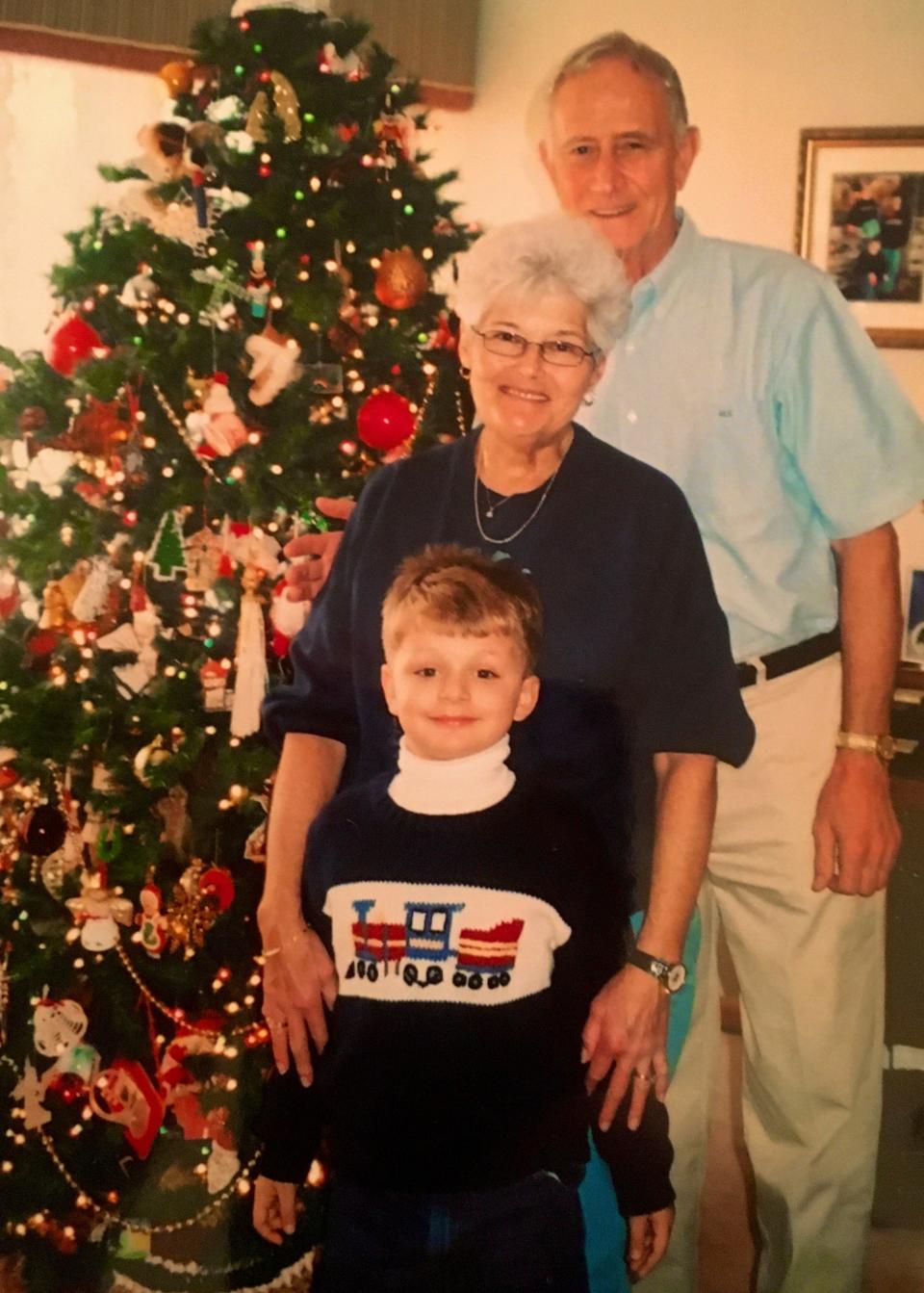 Mary and Glenn Christmas with their grandson Barton