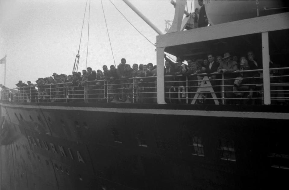 Never published. The Saturnia docks at at Ellis Island, 1950. (Alfred Eisenstaedt—Time & Life Pictures/Getty Images) <br> <br> <a href="http://life.time.com/history/ellis-island-rare-photos-from-the-gateway-to-a-new-world-1950/#1" rel="nofollow noopener" target="_blank" data-ylk="slk:Click here to see the full collection at LIFE.com;elm:context_link;itc:0;sec:content-canvas" class="link ">Click here to see the full collection at LIFE.com</a>