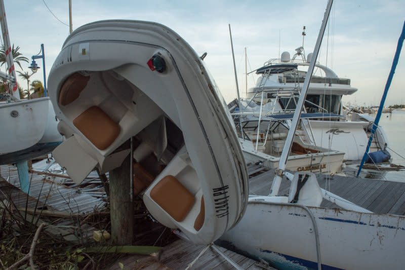 Boats mangled by Hurricane Irma lie in a mess at Bayshore Marina in Miami on September 11, 2017. On September 9, 2017, Hurricane Irma made landfall in Florida, leaving millions in the state without power. The Category 5 storm was blamed for more than 130 deaths throughout the Caribbean and the United States. File Photo by Ken Cedeno/UPI