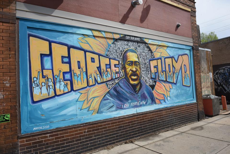 A mural outside of Unity Foods in Minneapolis depicts George Floyd.