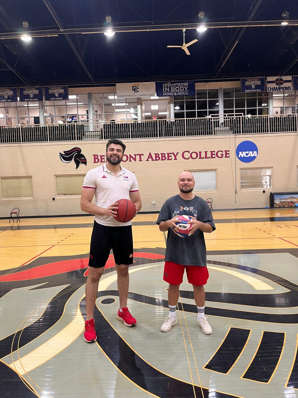 Boško Bojović and Conrad Hill are two international student athletes at Belmont Abbey College who graduated alongside 225 of their peers Saturday, May 14, at Belmont Abbey College’s Mary Help of Christians Basilica Piazza.