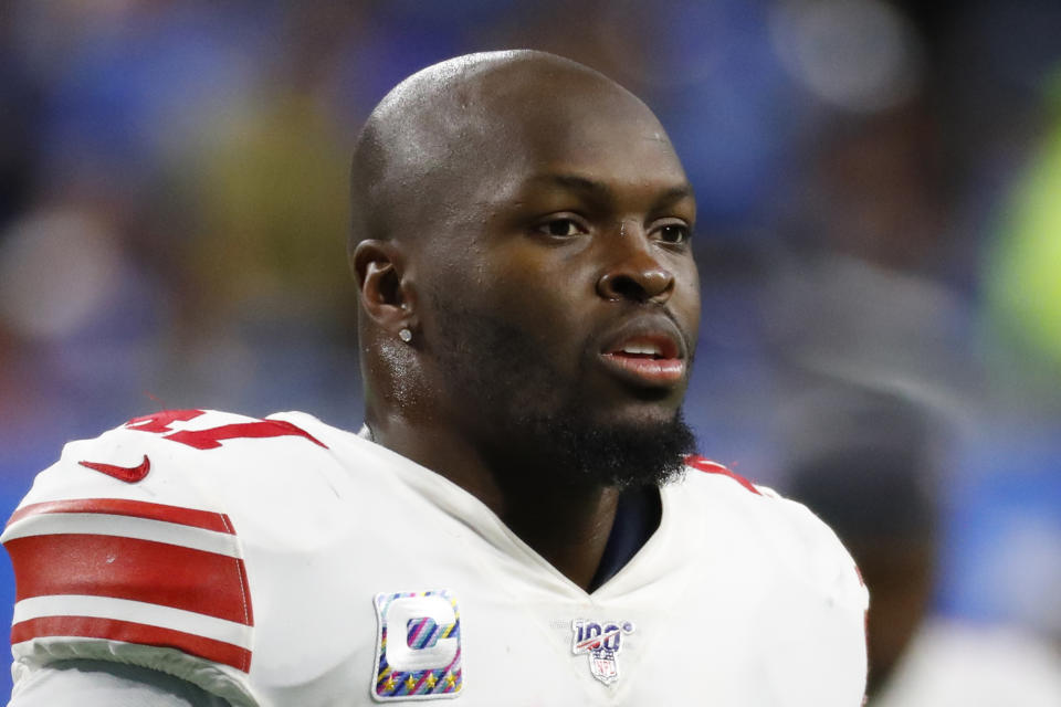 FILE - In this Oct. 27, 2019, file photo, New York Giants outside linebacker Alec Ogletree watches during an NFL football game against the Detroit Lions in Detroit. The New York Giants released linebackers Alec Ogletree and Kareem Martin, clearing significant salary cap space Wednesday, Feb. 26, 2020, with the departure of their two most expensive defensive players. (AP Photo/Paul Sancya, File)