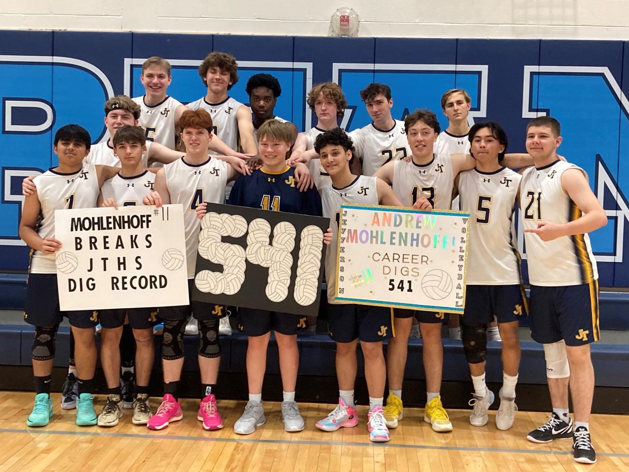 The Jefferson volleyball team celebrates junior libero Andrew Mohlenhof, who broke the school record for digs in the second set of the Northwest Jersey Athletic Conference final on May 4, 2024.