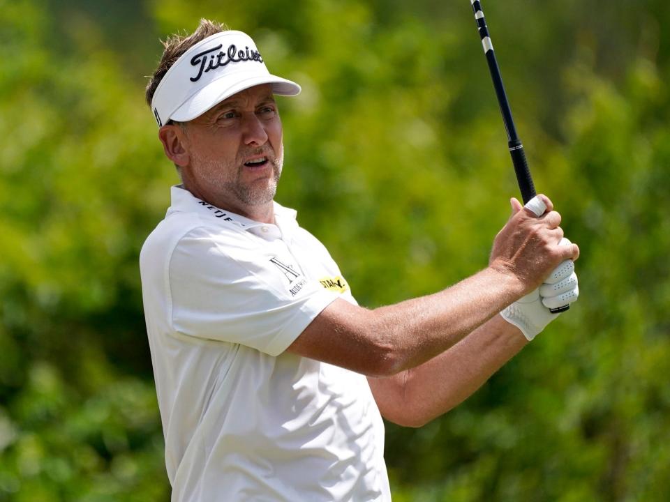 Ian Poulter watches his shot at the 2022 Zurich Classic.