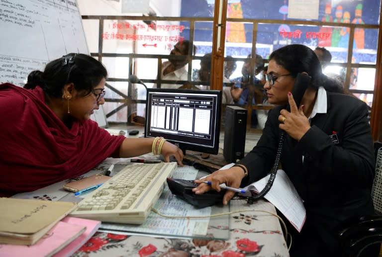 Mahima Dutt Sharma rolls her eyes when men make excuses to gawk at her inside the booth where she checks tickets at India's only interstate train station run entirely by women