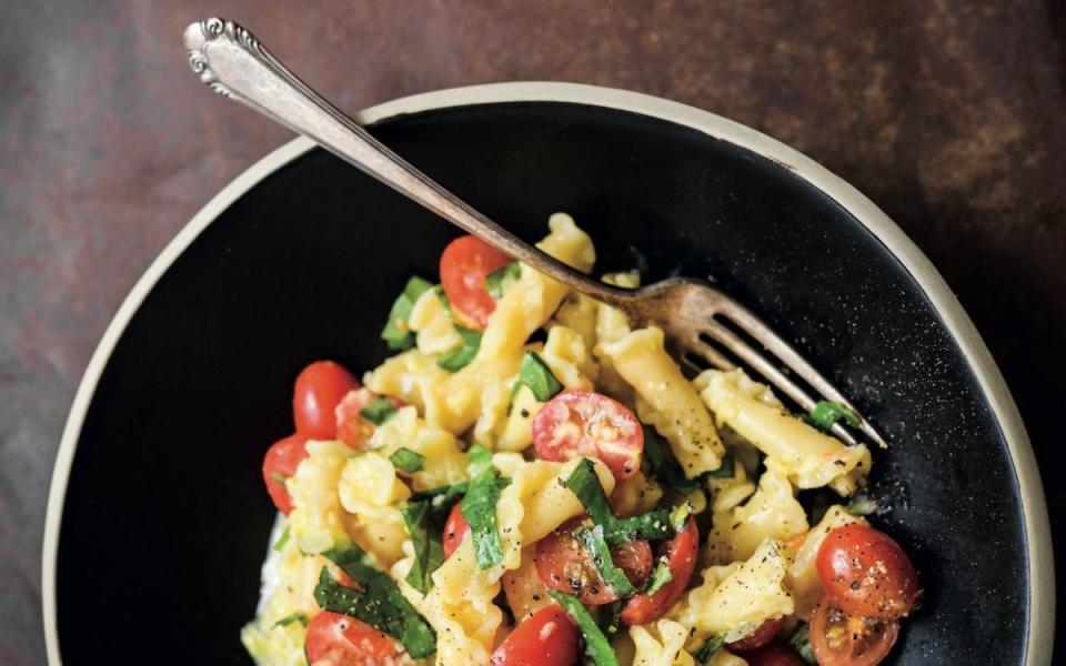 Connie Miller<p>This cheery weeknight-friendly pasta recipe, from Milk Street: The New Rules, is proof that you don’t always need cream or cheese for creamy results.</p><p><strong>Get the recipe: <a href="/949573/parade/campanelle-pasta-with-sweet-corn-tomatoes-and-basil/" data-ylk="slk:Campanelle Pasta with Sweet Corn, Tomatoes and Basil;elm:context_link;itc:0;sec:content-canvas" class="link "><em>Campanelle Pasta with Sweet Corn, Tomatoes and Basil</em></a></strong></p>