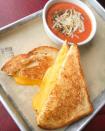 <p><strong>Grilled Tillamook Cheddar Sandwich</strong></p><p>We all love a good grilled cheese, but Oregon’s local Tillamook cheddar cheese is definitely an original. <a href="https://www.bunksandwiches.com/" rel="nofollow noopener" target="_blank" data-ylk="slk:Bunk Sandwiches;elm:context_link;itc:0;sec:content-canvas" class="link ">Bunk Sandwiches</a> in Portland, the extra-cheesy sandwich served with a side of creamy tomato soup goes hand-in-hand.</p>