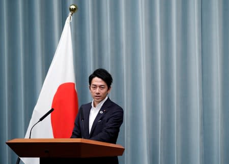Japan's Environment Minister Koizumi attends a news conference at PM Abe's official residence in Tokyo