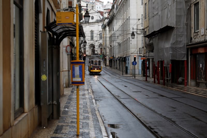 A tram is pictured at an empty street as the spread of the coronavirus disease (COVID-19) continues in downtown Lisbon