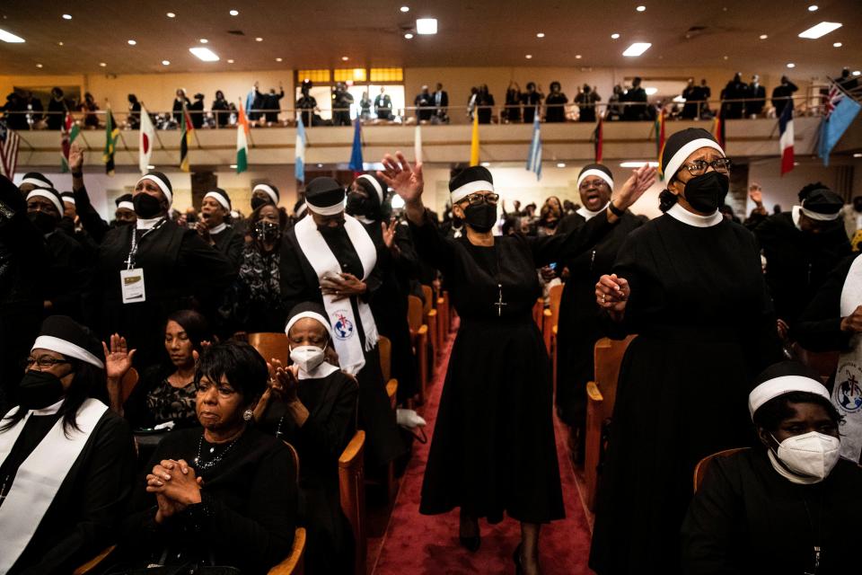 COGIC members worship and praise during an anointing service on Nov. 8, 2022 at the Historic Mason Temple in Memphis.