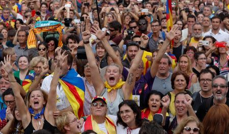 People celebrate after the Catalan regional parliament passes the vote of the independence from Spain in Barcelona, Spain, October 27, 2017. REUTERS/Yves Herman