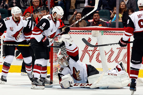 CALGARY, AB – FEBRUARY 13: Mike Smith #41 of the Arizona Coyotes makes a glove save against the Calgary Flames during an NHL game on February 13, 2017 at the Scotiabank Saddledome in Calgary, Alberta, Canada. (Photo by Gerry Thomas/NHLI via Getty Images)