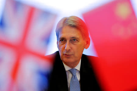 Chancellor of the Exchequer, Philip Hammond attends UK-China High Level Financial Services Roundtable at the Bank of China head office building in Beijing, China July 22, 2016. REUTERS/Damir Sagolj