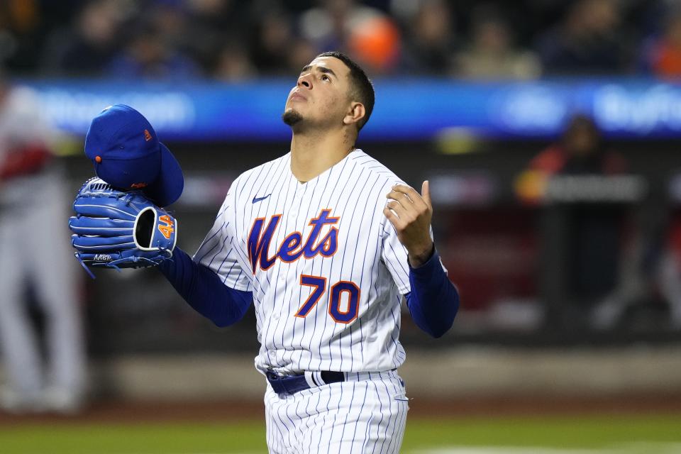 New York Mets starting pitcher Jose Butto gestures as he leaves the baseball game against the Washington Nationals the fifth inning Tuesday, April 25, 2023, in New York. (AP Photo/Frank Franklin II)