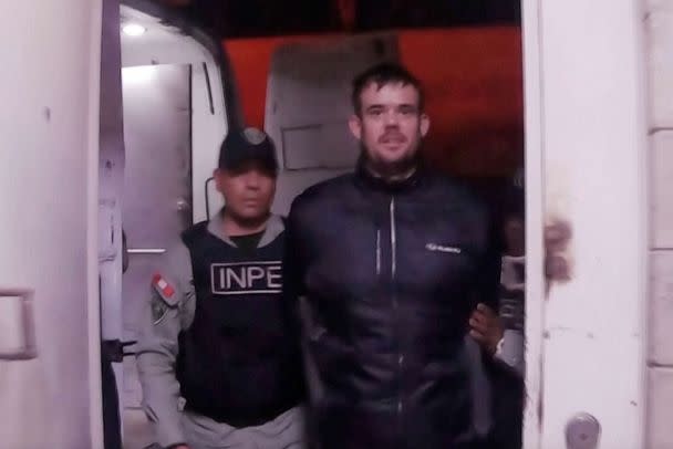 PHOTO: Peru releases new footage of Joran van der Sloot's transfer to Lima, Peru, ahead of his extradition to the U.S. (National Penitentiary Institute of Peru via Reuters)
