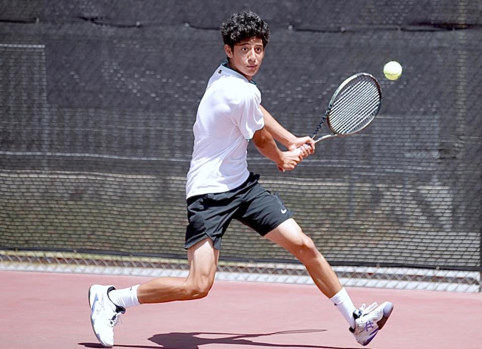 Sophomore Kristian Sharma won two sets at No. 1 singles for Granada Hills on Wednesday.