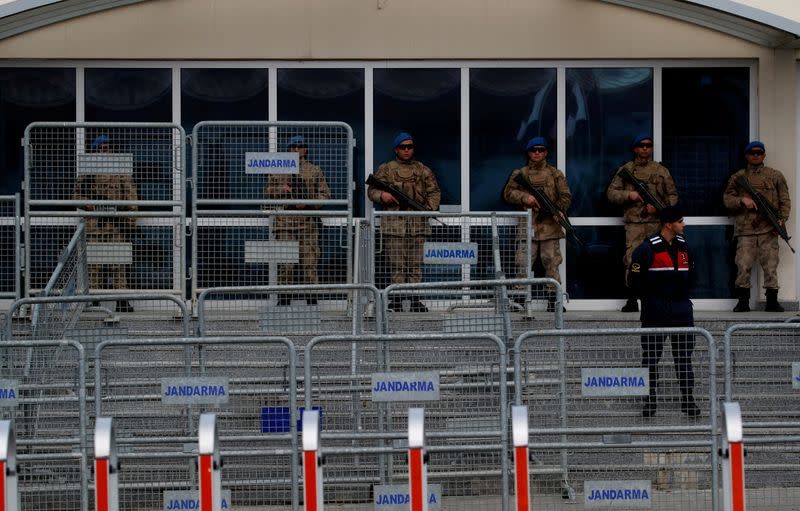 Turkish soldiers stand guard outside a courtroom at the Silivri Prison and Courthouse complex in Silivri near Istanbul