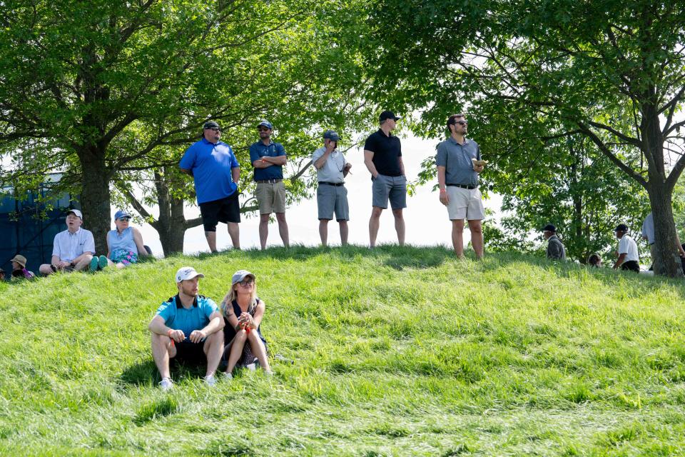 Fans watch golfers practice for the PGA Championship on Monday, May 13, 2024 at Valhalla Golf Course.